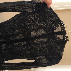 Black lace and sheer bodysuit